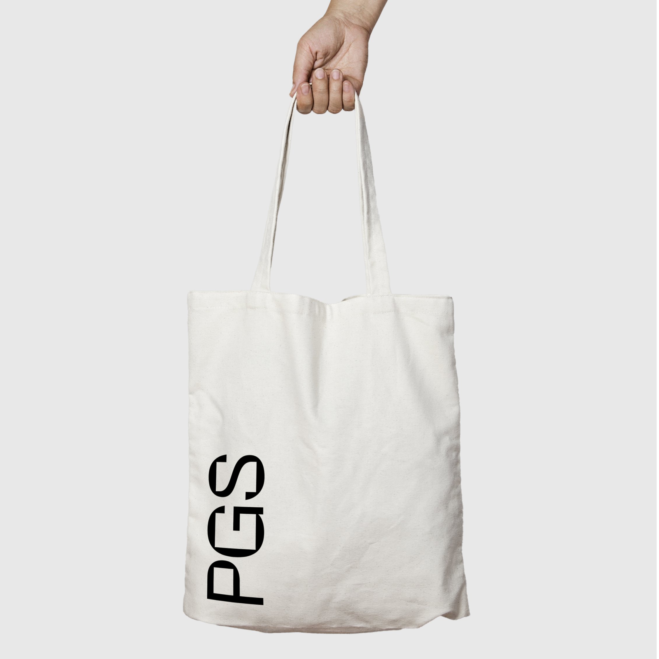 Canvas tote bag with the PGS logotype.
